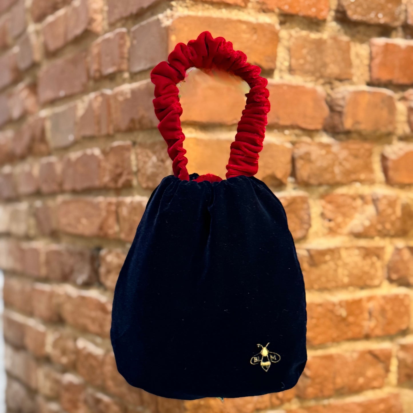 Bolso saquito Rubis reversible