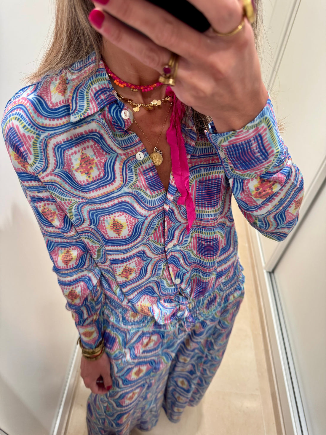 Conjunto pantalón geométrico azul y rosa