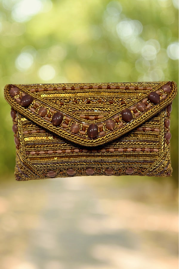 Cartera piedras malva