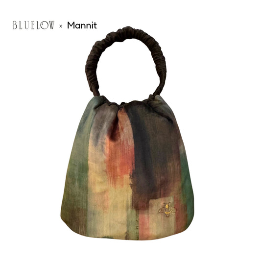 Bolso saquito Terre reversible