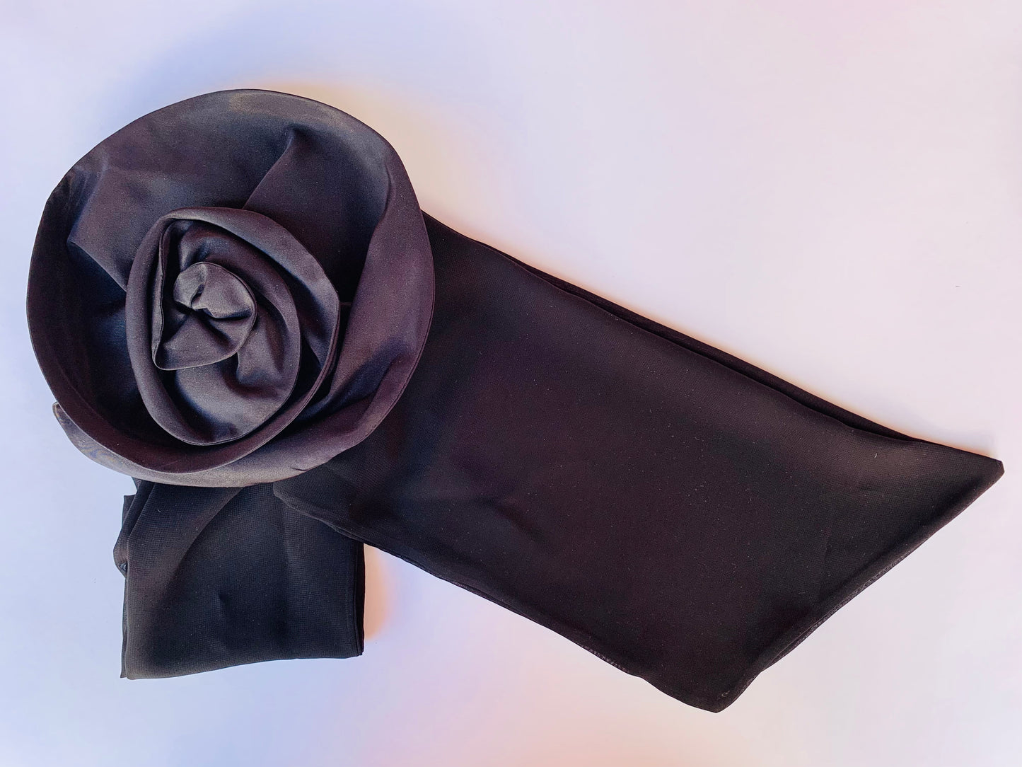 Bow with black flower