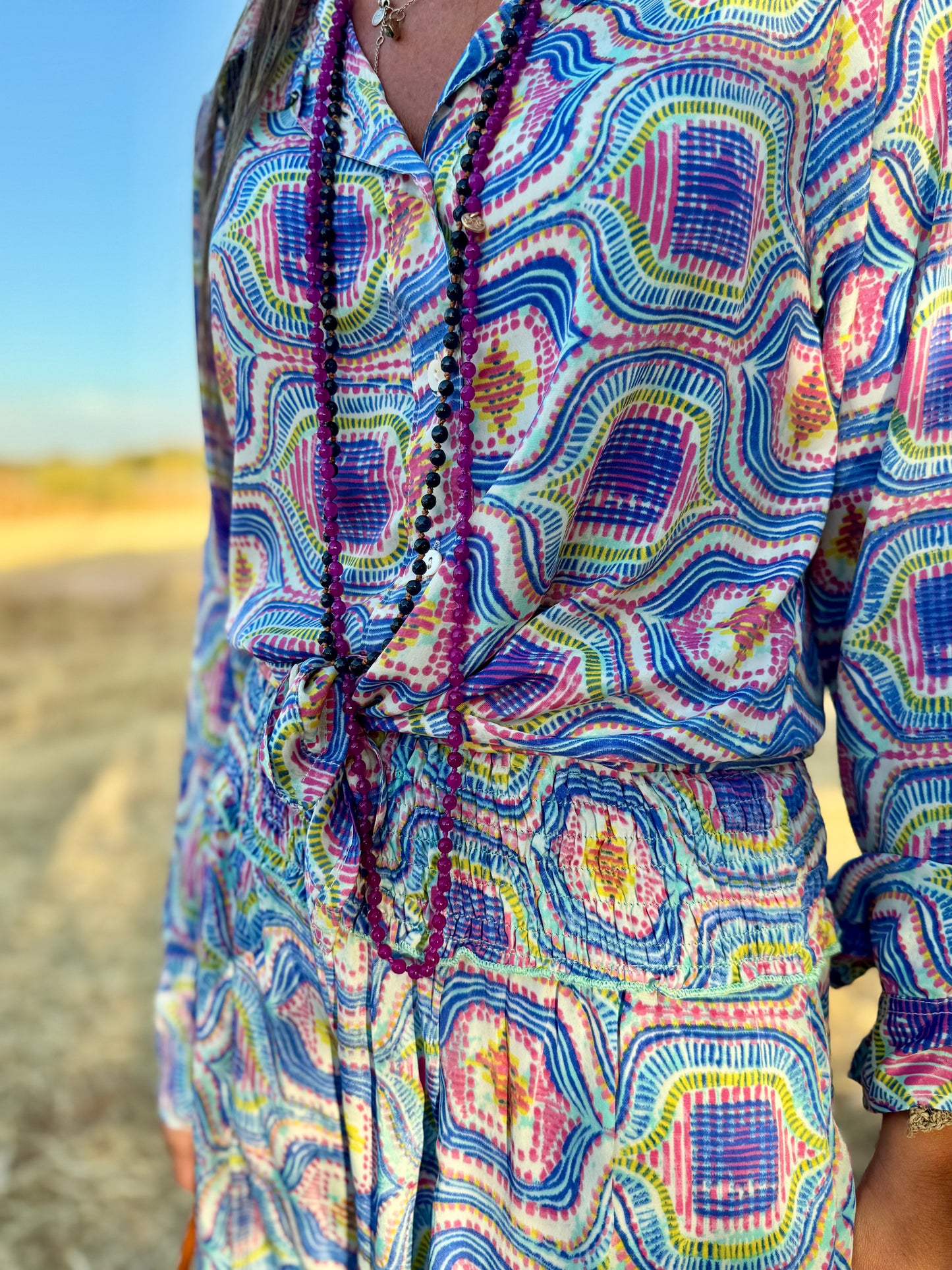 Conjunto pantalón geométrico azul y rosa